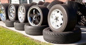 Multiple tires of various sizes and treads stacked up. | Car Dealer in Ellisville, MO