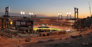 Profile view of the Busch Stadium in St. Louis lit up.